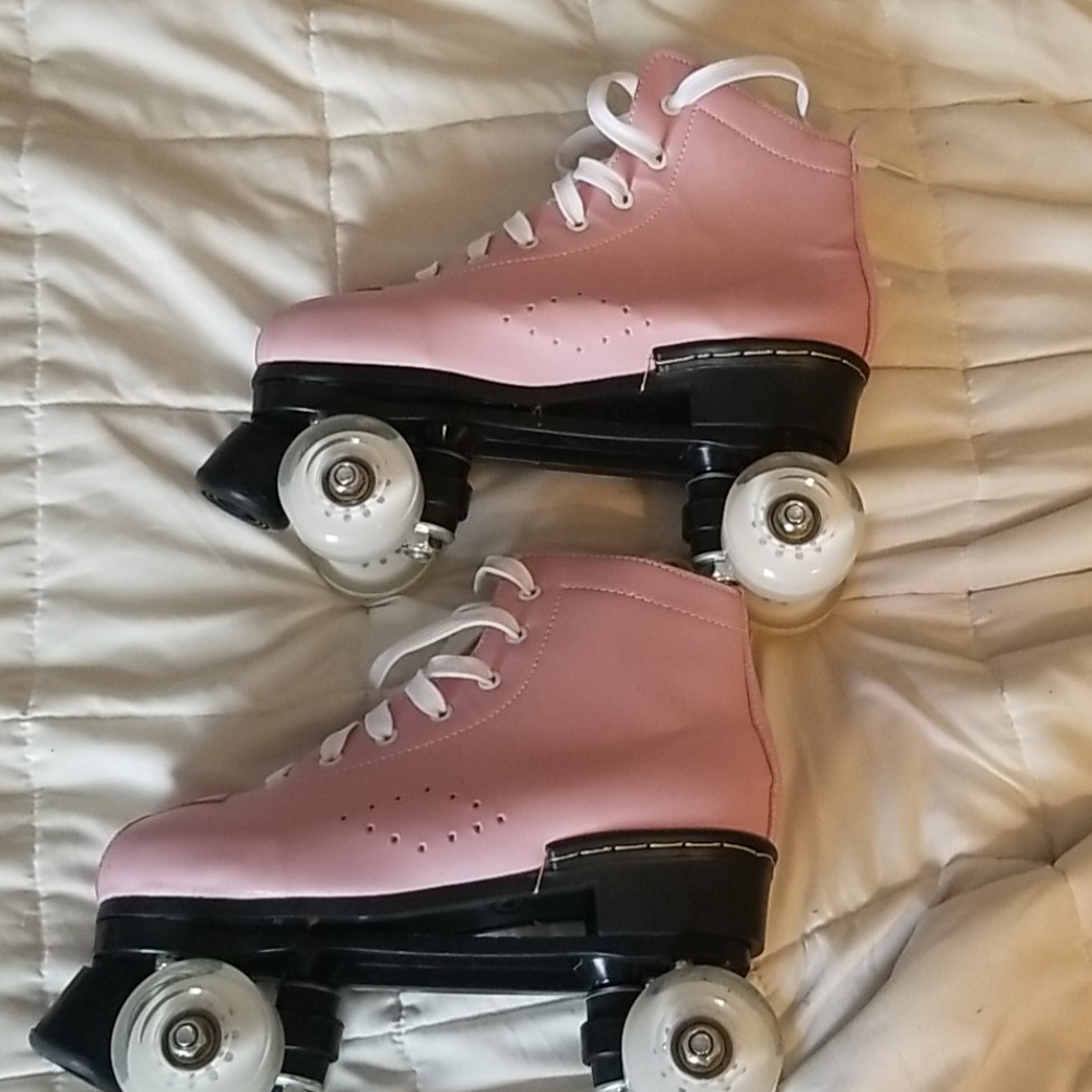 Pink pleather roller skates